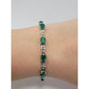 14kt White Gold Tennis Bracelet With 9ctw Natural Emeralds Measuring 7.25in Weighing 7.25g